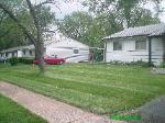 Florissant, MO Overgrown lawn mowing after